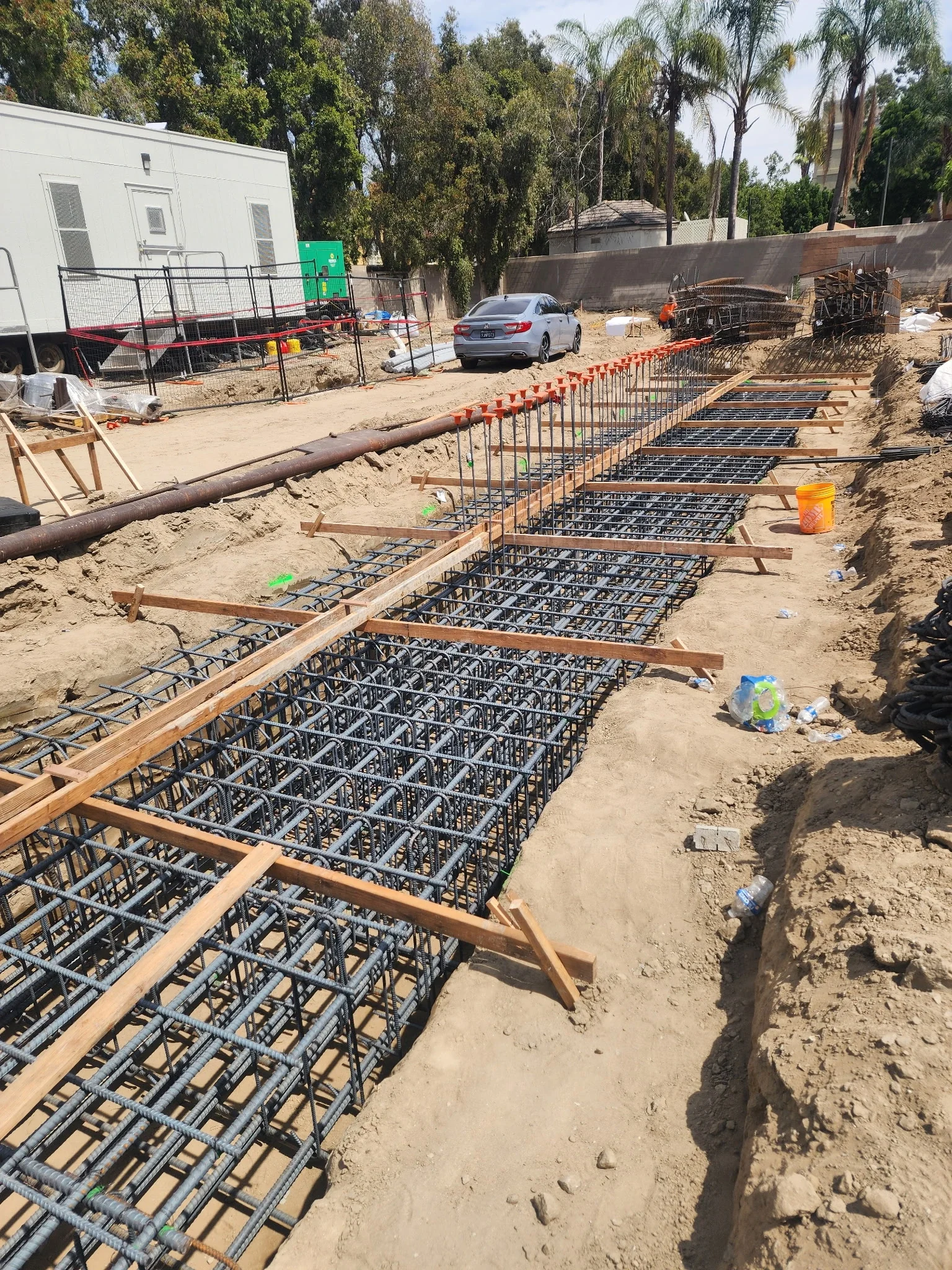 High-end residential foundation and retaining wall contact support